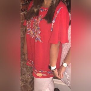 Red and floral stitch blouse